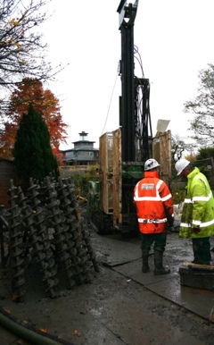 A drill preparing for installation of a ground source heat pump 