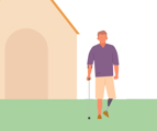 man with prosthetic leg outside house