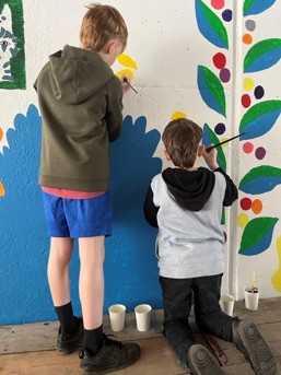 Boys painting at Meldreth underpass