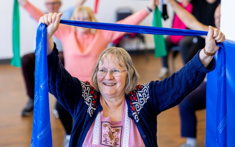 1 Woman doing chair based exercise Copyright Centre for Ageing Better.jpg