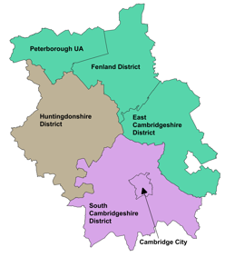 A color-coded map showing administrative districts in Cambridgeshire and Peterborough. The map includes:  Peterborough UA in teal at the top left, Fenland District in teal at the top center, East Cambridgeshire District in teal on the right, Huntingdonshire District in brown on the left, South Cambridgeshire District in purple at the bottom and Cambridge City marked in the center with a black arrow pointing to it.