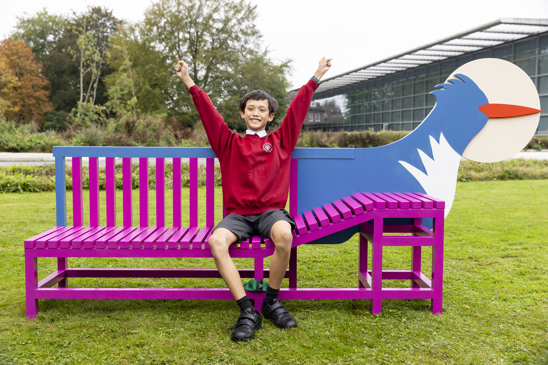 A Melbourn pupil on his winning dog bench