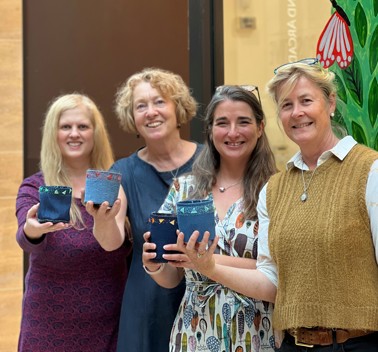 1 Sew Positive CEO and Founder Melissa Santiago-Val (3rd left) with volunteers (l-r) Helen Edwards, Margot Eagle, Sue Ward at Grand Arcade's Let's Go Circular Festival