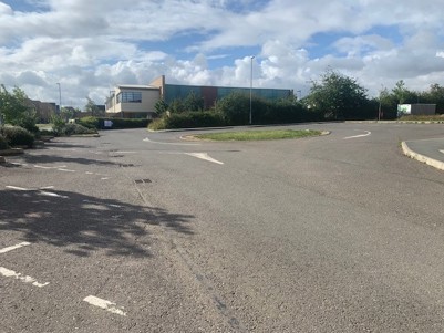 Grey tarmac car park