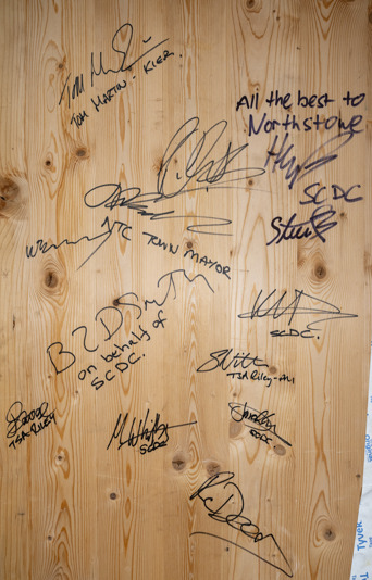 Board signing by SCDC councillors, staff, Kier reps, and Northstowe TC